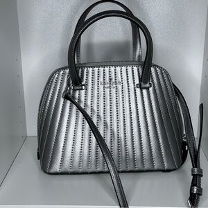 Like new no tags.  Art deco feel